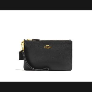 coach wristlet (sonic pink)